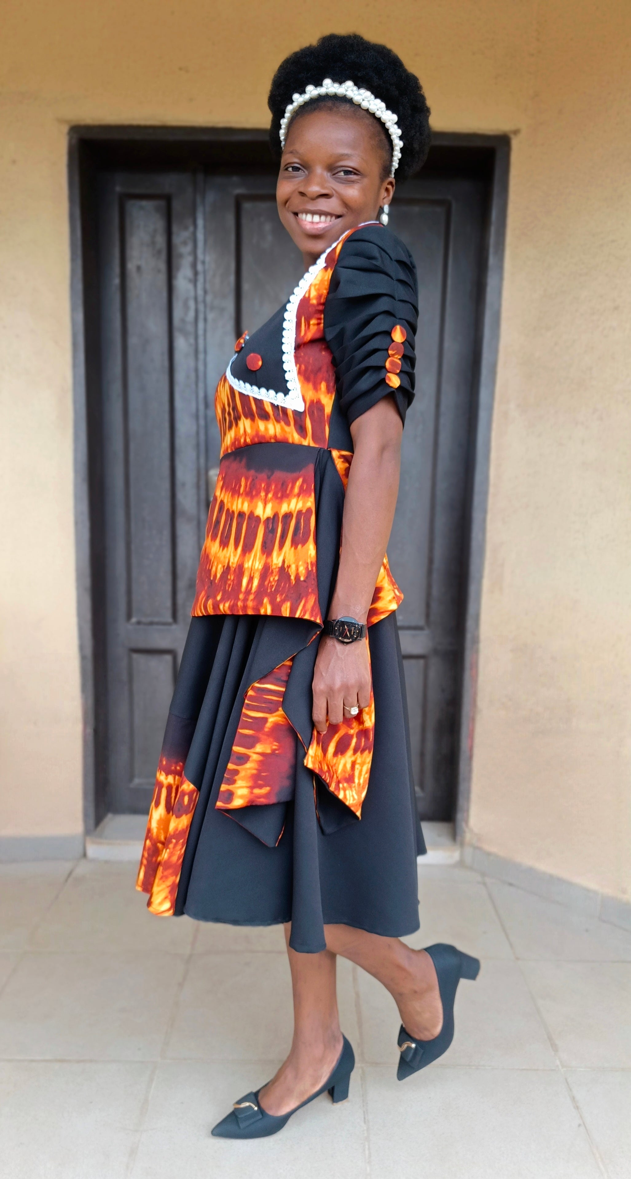 The Lara Adire Peplum Gown