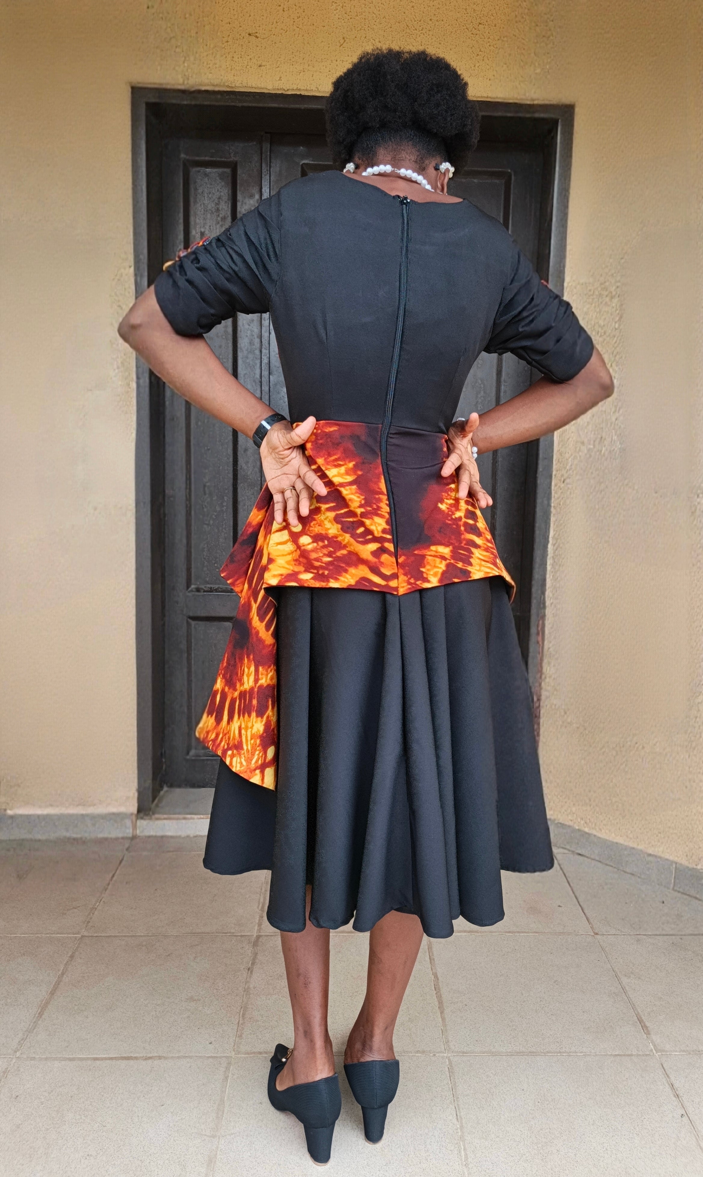 The Lara Adire Peplum Gown