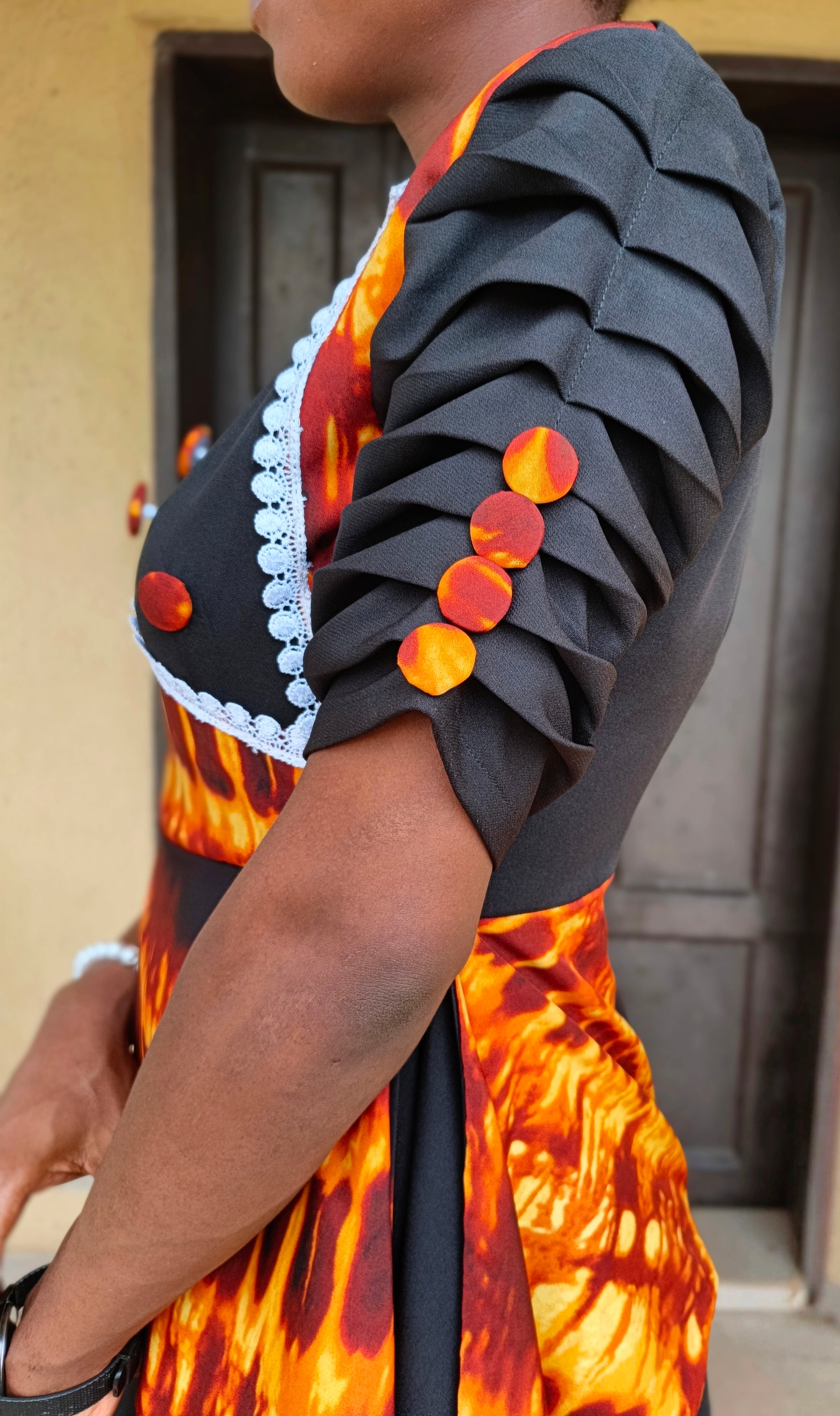 The Lara Adire Peplum Gown