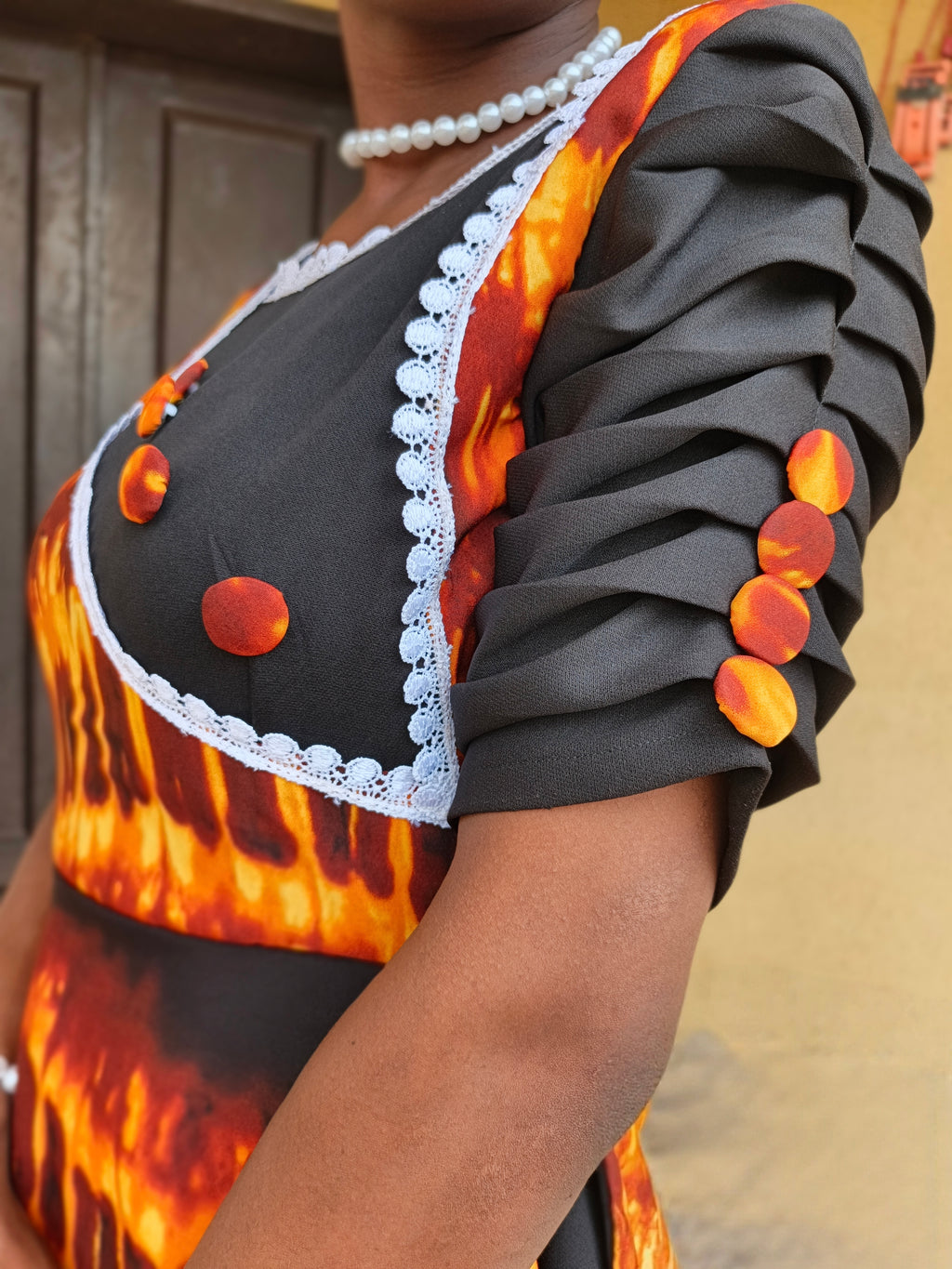 The Lara Adire Peplum Gown