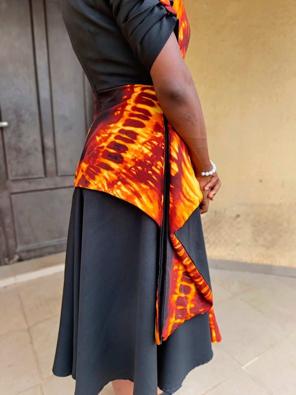 The Lara Adire Peplum Gown