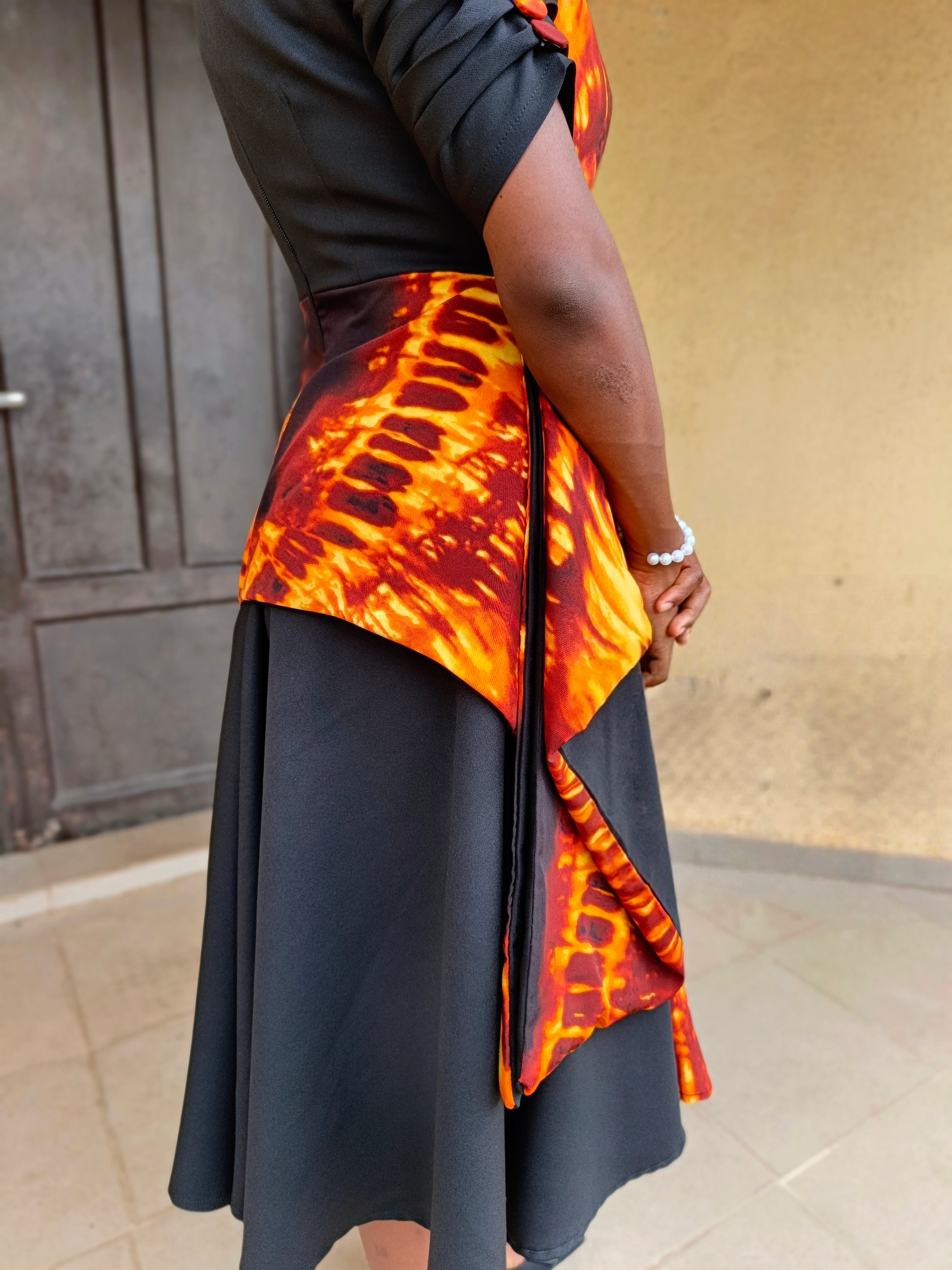The Lara Adire Peplum Gown