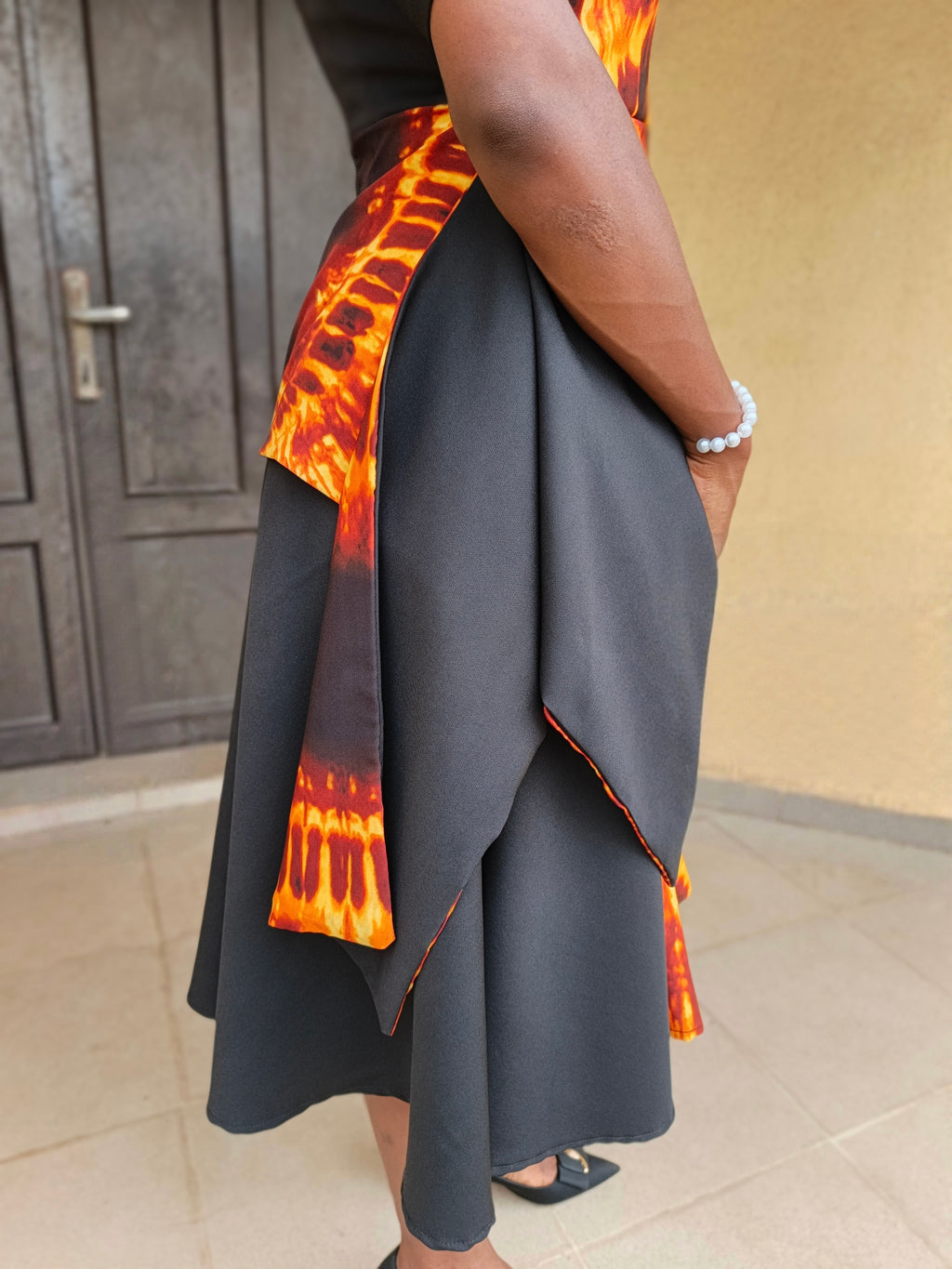 The Lara Adire Peplum Gown